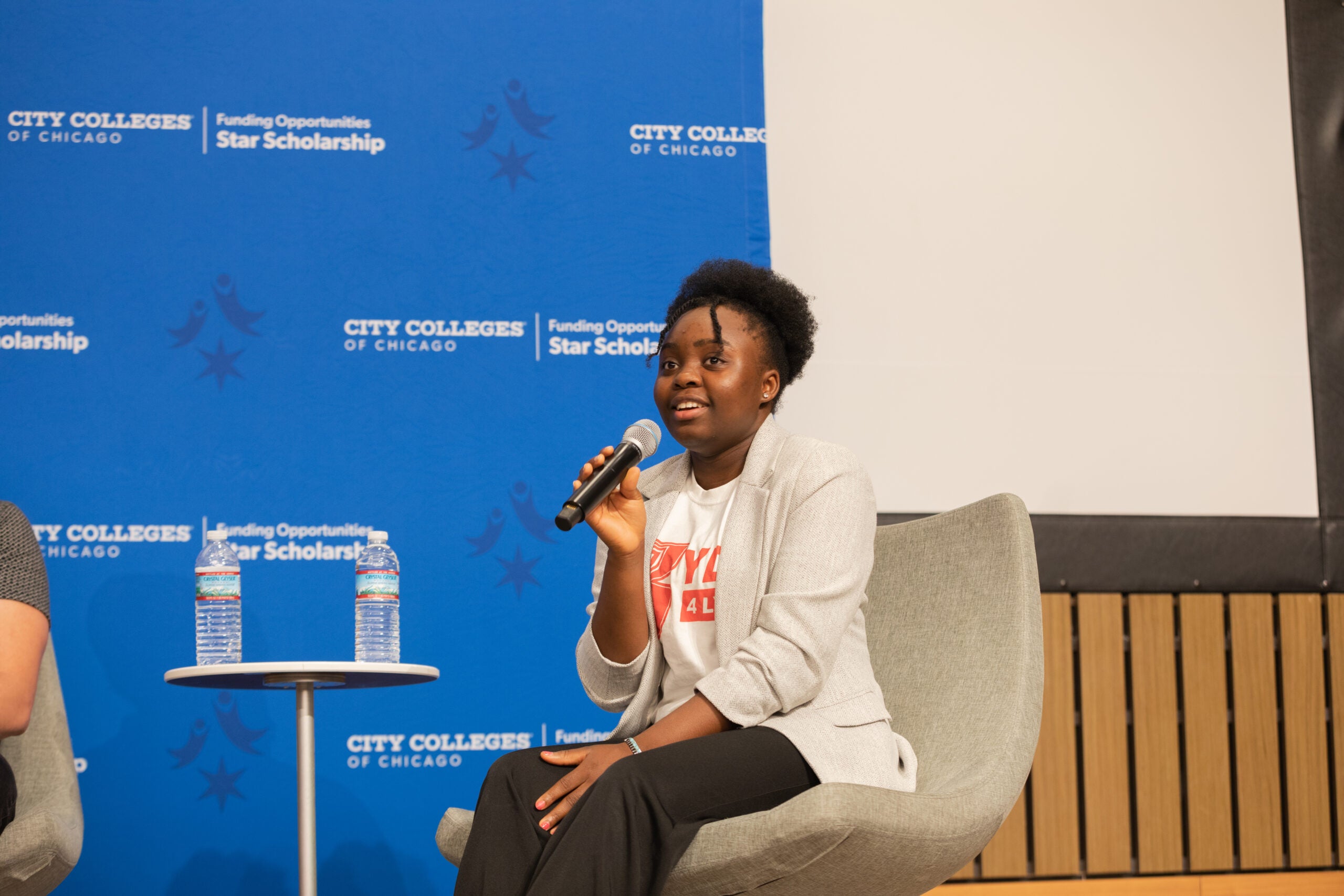 Star Scholar Favour Gbadamosi speaks to the crowd on the panel.