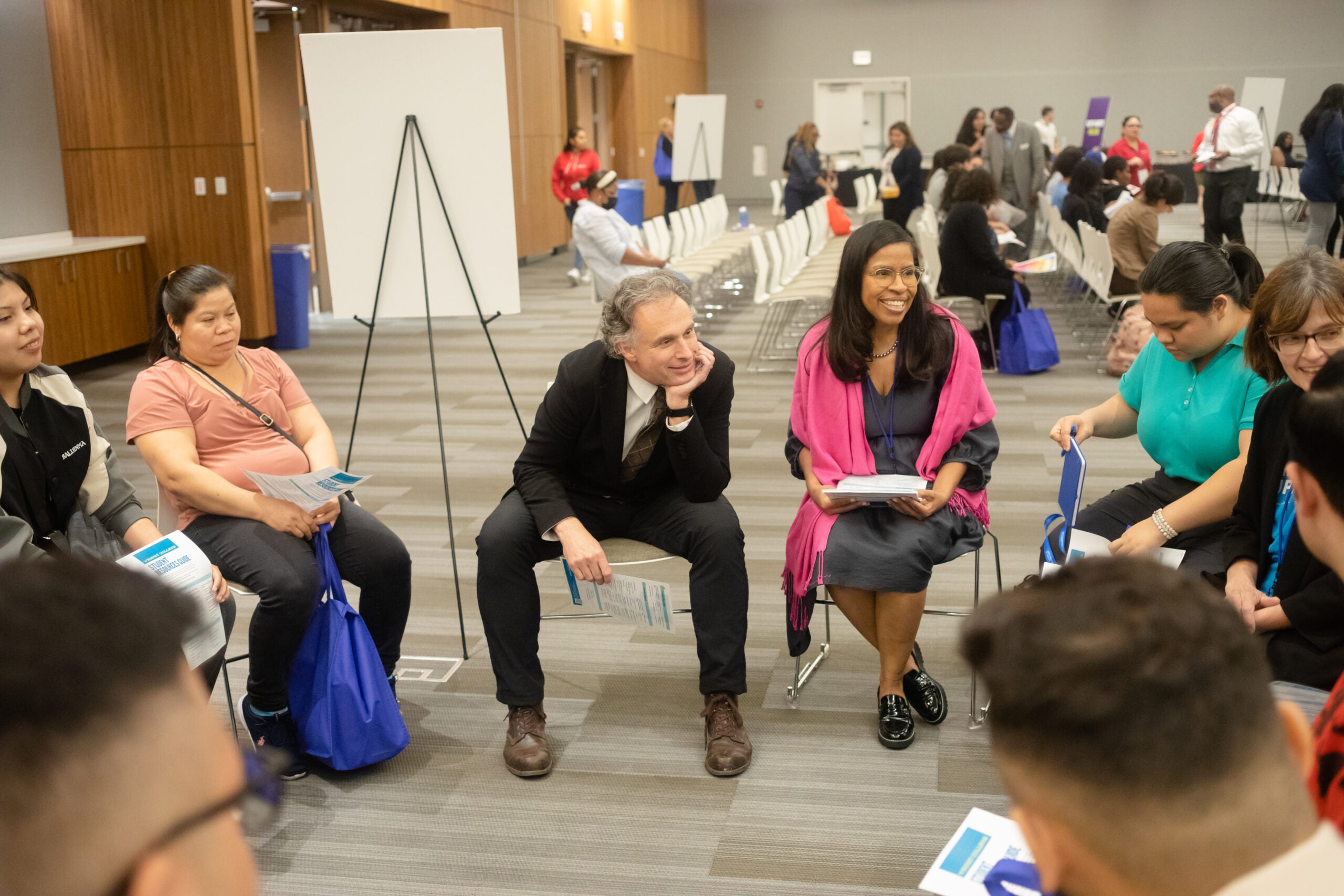 President Potash meets with Wright scholars who sit in a circle.